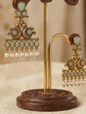 Gold twin-peacock jhumkas